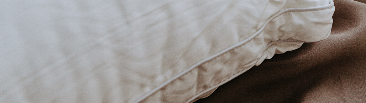 white piping on pillow
